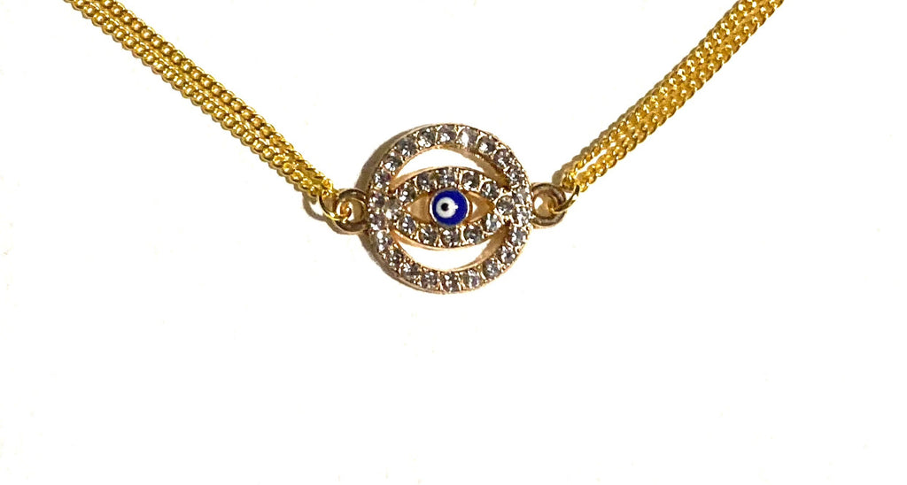 سلسال ذهبي، بتصميم عين ذهبية مرصّعة  بفصوص براقة